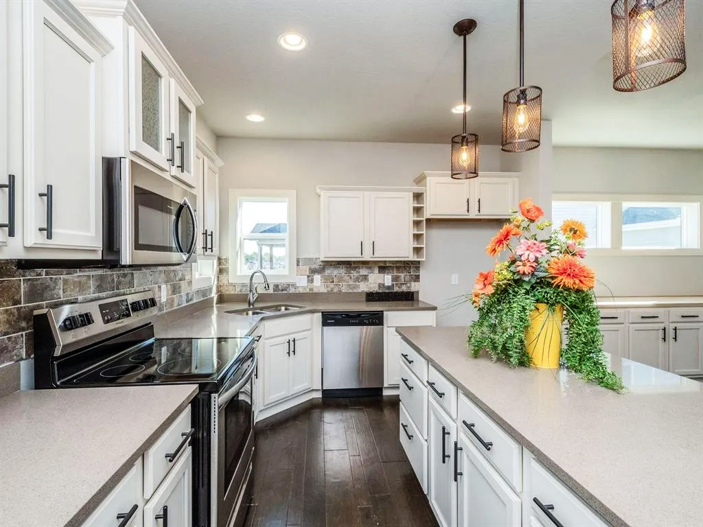 kitchen with island and a sink